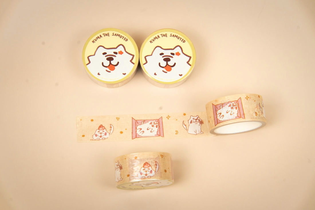 Two rolls of tape with dog faces